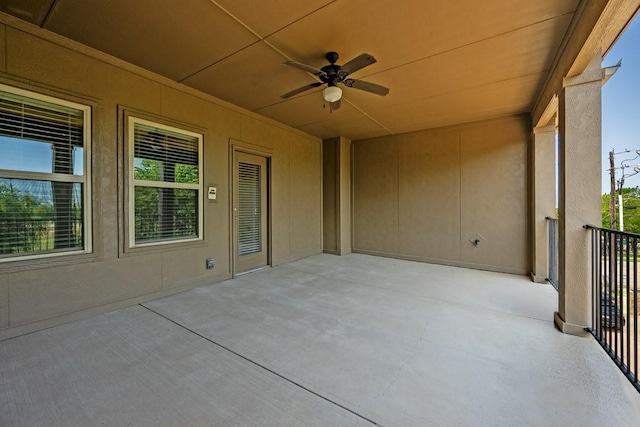 view of patio / terrace featuring a balcony and ceiling fan