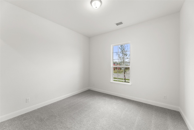 unfurnished room featuring carpet floors