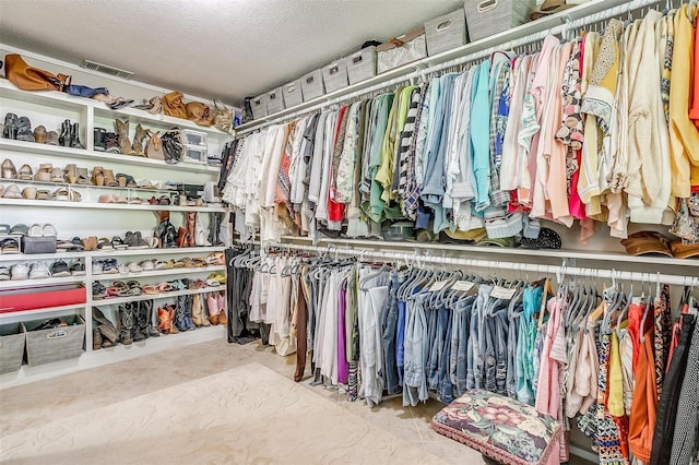 walk in closet with visible vents
