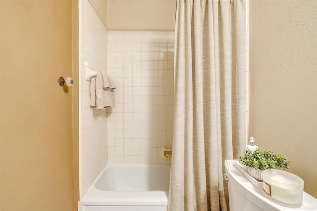 bathroom with shower / bathtub combination with curtain