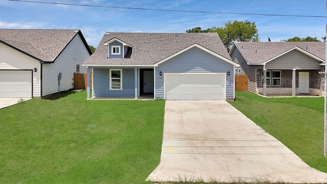 ranch-style house with a garage and a front lawn