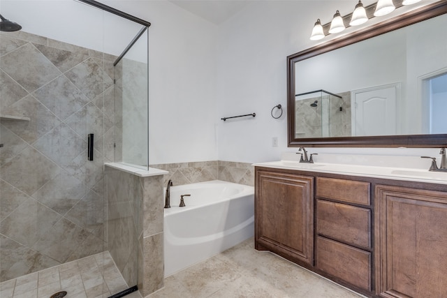 bathroom with shower with separate bathtub, dual bowl vanity, and tile patterned floors