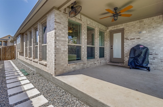 view of patio featuring ceiling fan