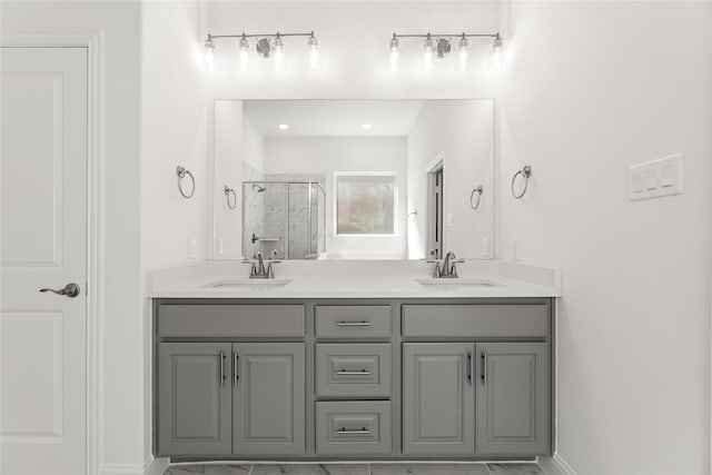 bathroom with an enclosed shower and vanity