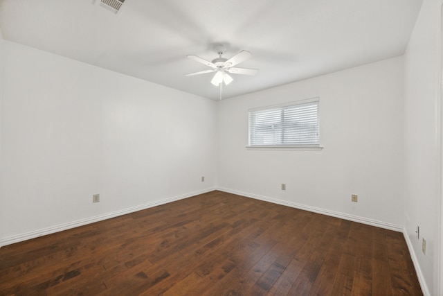 empty room featuring ceiling fan and hardwood / wood-style floors