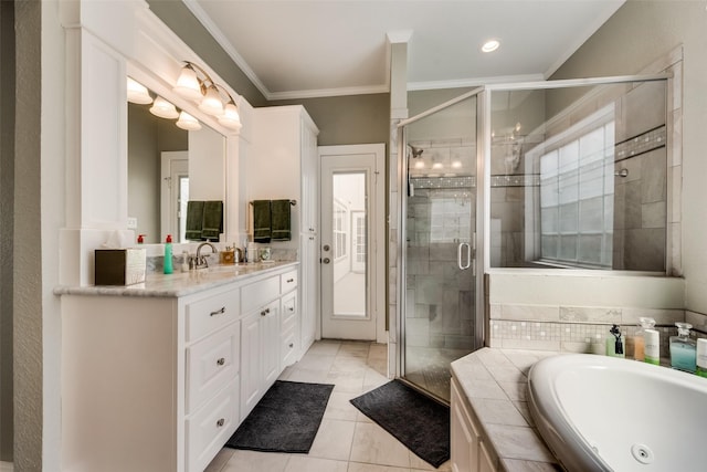 bathroom with vanity, ornamental molding, separate shower and tub, and tile patterned flooring