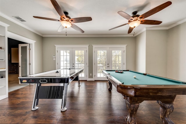 game room featuring dark hardwood / wood-style floors, ornamental molding, pool table, and french doors