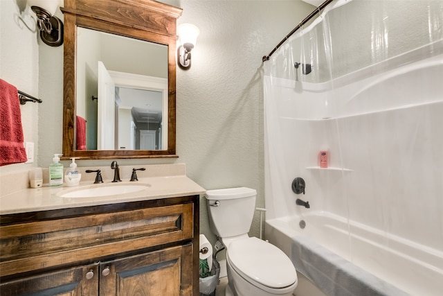 full bathroom featuring toilet, shower / tub combo, and vanity