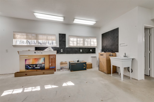 living room with concrete flooring