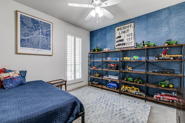 carpeted bedroom with ceiling fan