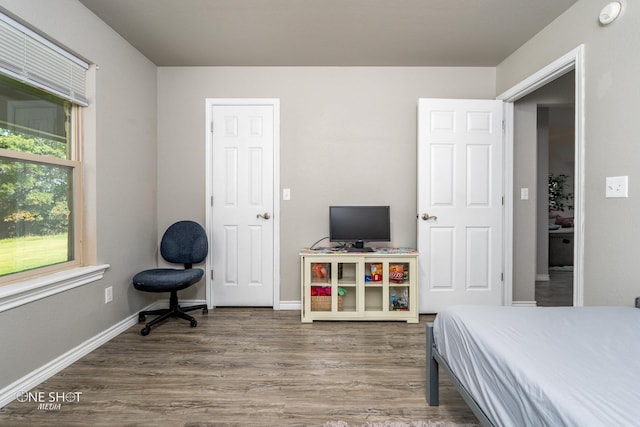 bedroom featuring hardwood / wood-style floors