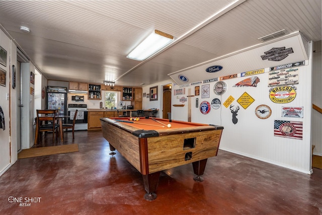 game room featuring bar area and billiards