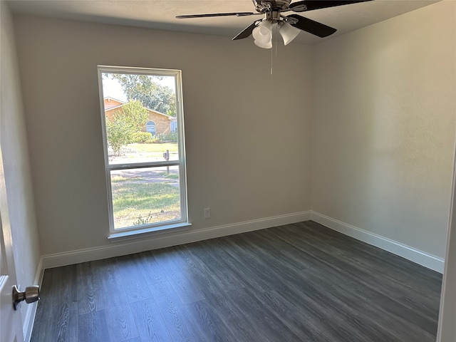 empty room with hardwood / wood-style floors and ceiling fan