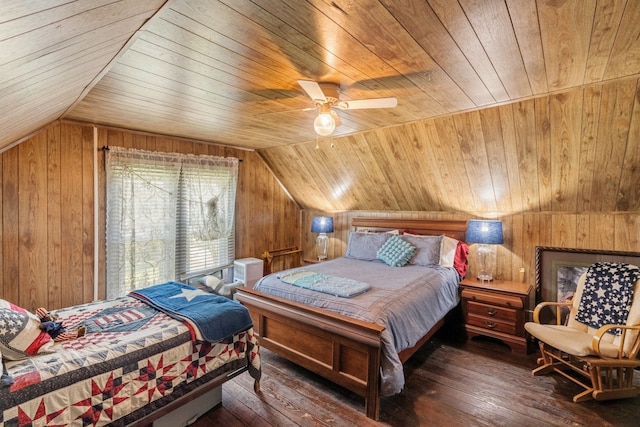 bedroom featuring lofted ceiling, wooden walls, and dark hardwood / wood-style flooring