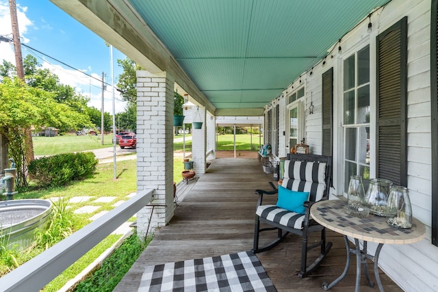 deck featuring a yard