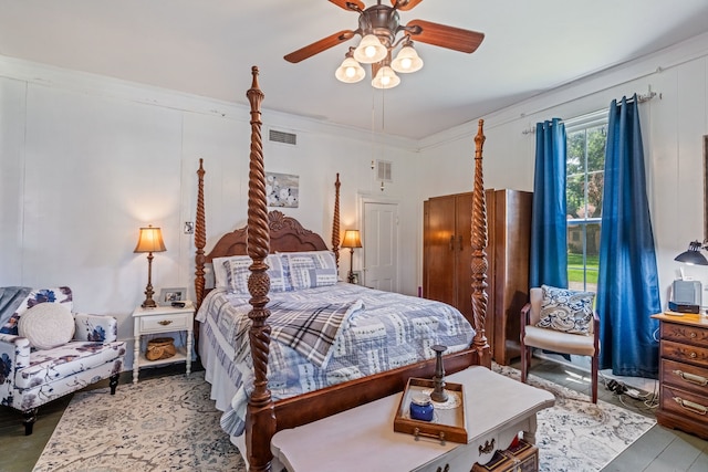 bedroom with ornamental molding and ceiling fan