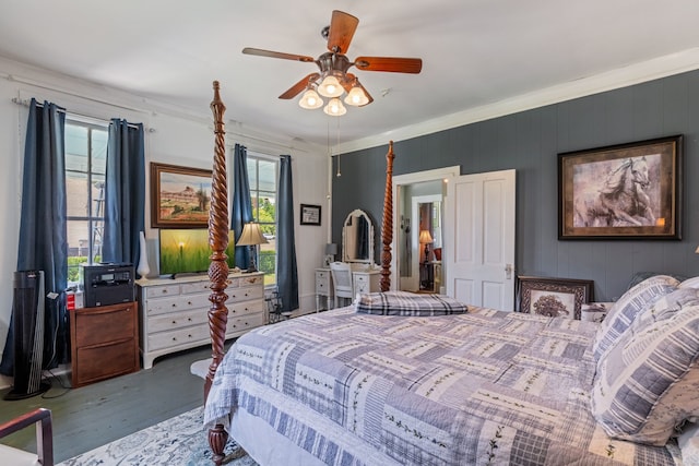 bedroom featuring wood-type flooring and ceiling fan