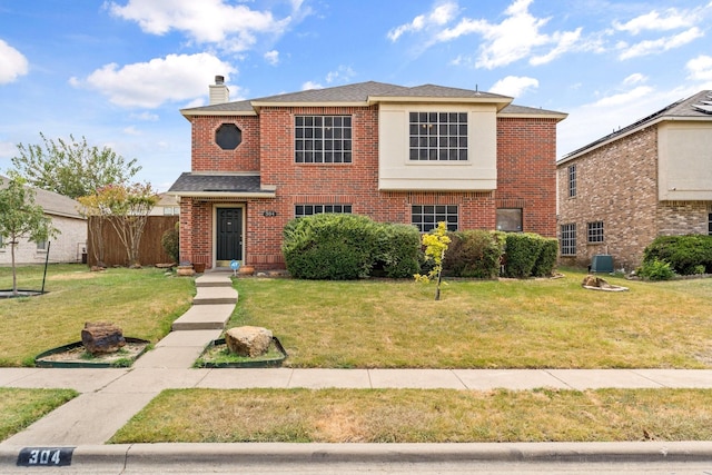 view of front of property featuring a front yard