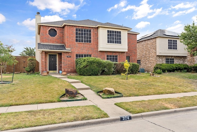 view of front facade featuring a front yard