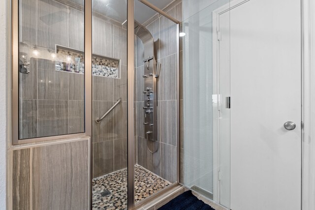 bathroom with an enclosed shower