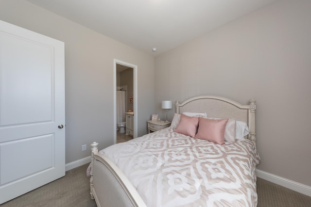 carpeted bedroom with ensuite bath