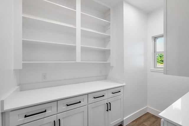 4836 S Theresa, Denison, TX 75020 - bar with dark wood-style floors and baseboards