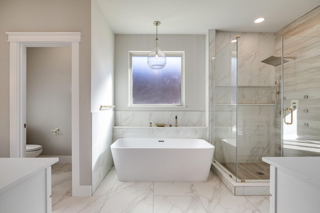 4836 S Theresa, Denison, TX 75020 - bathroom featuring recessed lighting, marble finish floor, vanity, a soaking tub, and a stall shower