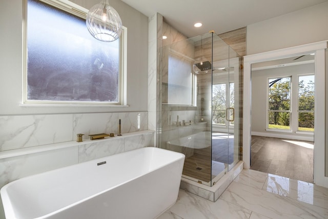 4836 S Theresa, Denison, TX 75020 - full bath with recessed lighting, a freestanding bath, a shower stall, and marble finish floor