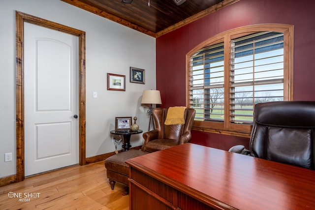 office space featuring wood ceiling, light wood-type flooring, and ornamental molding