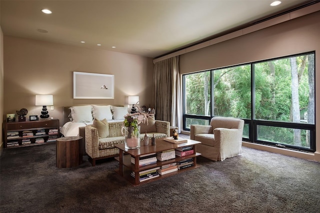 living room with a healthy amount of sunlight and carpet flooring