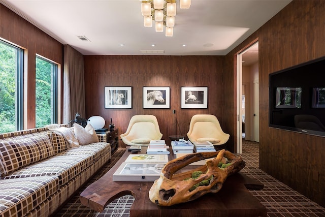 living room featuring wood walls