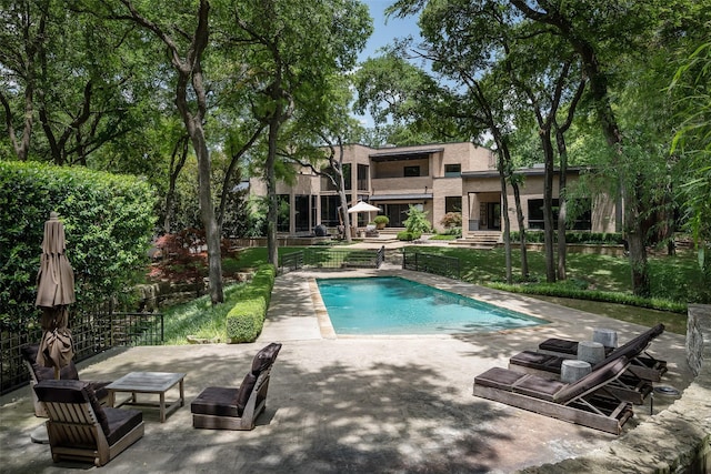 view of pool featuring a patio area