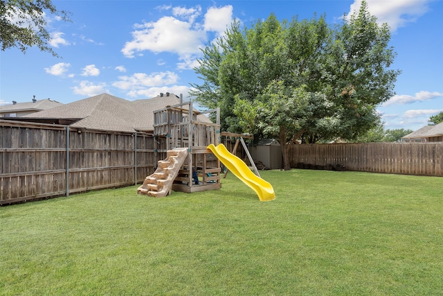 view of jungle gym with a yard