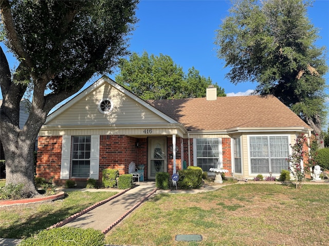 view of front of house with a front yard