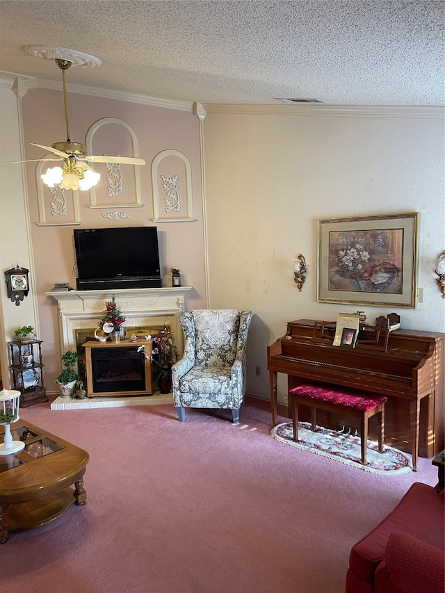 living room with crown molding, carpet, ceiling fan, and a textured ceiling