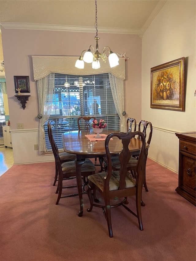 carpeted dining space featuring ornamental molding, an inviting chandelier, and a wealth of natural light