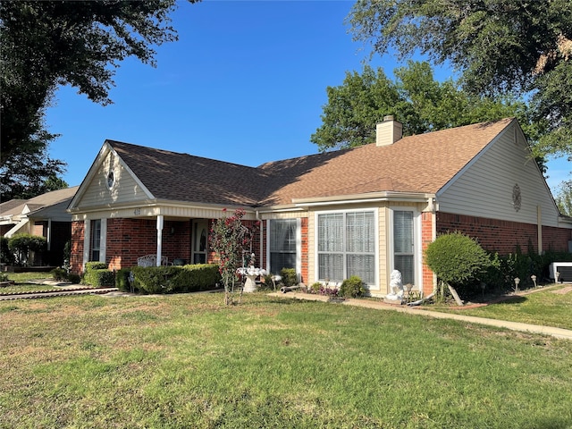 single story home featuring a front yard