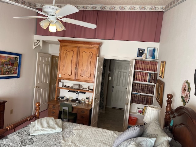 tiled living room featuring ceiling fan