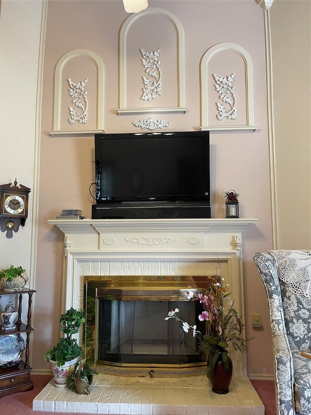 room details with carpet floors and a brick fireplace