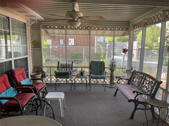 sunroom / solarium with ceiling fan