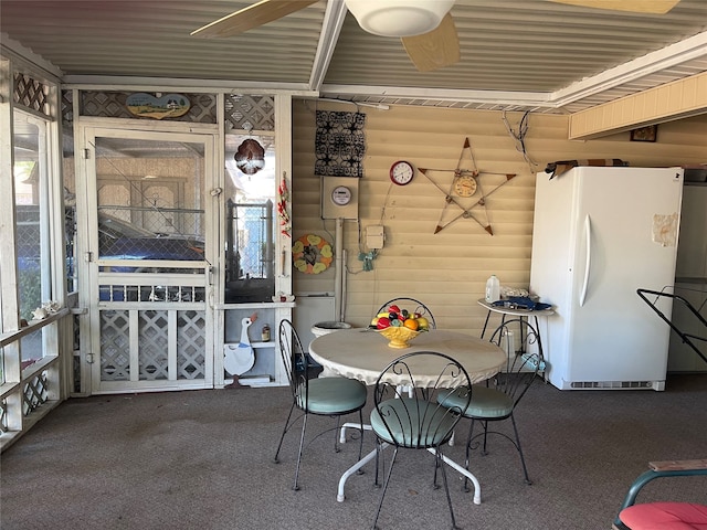 interior space featuring ceiling fan