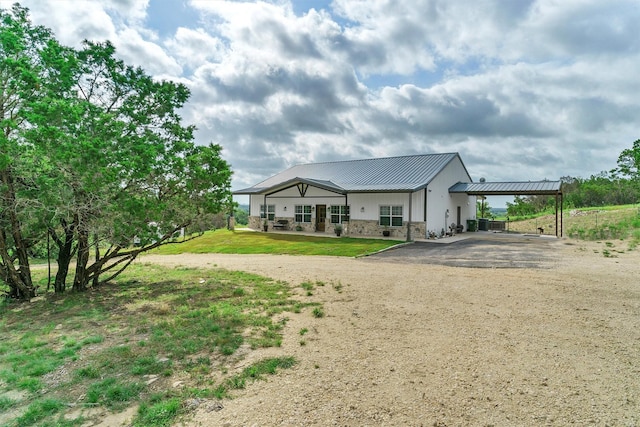 exterior space featuring a carport