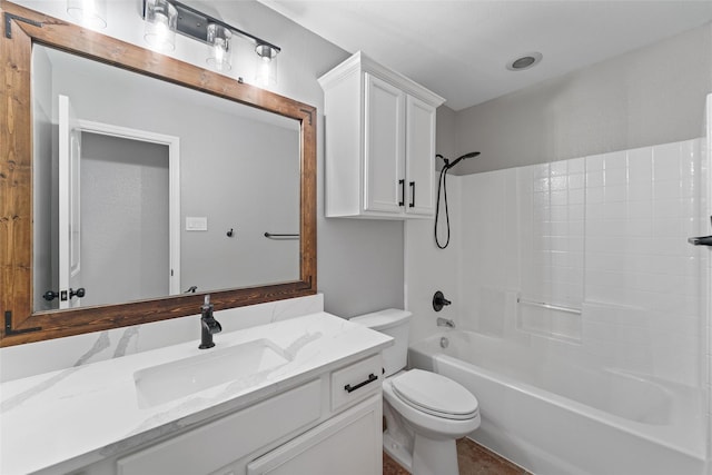 full bathroom with shower / bathing tub combination, vanity, and toilet