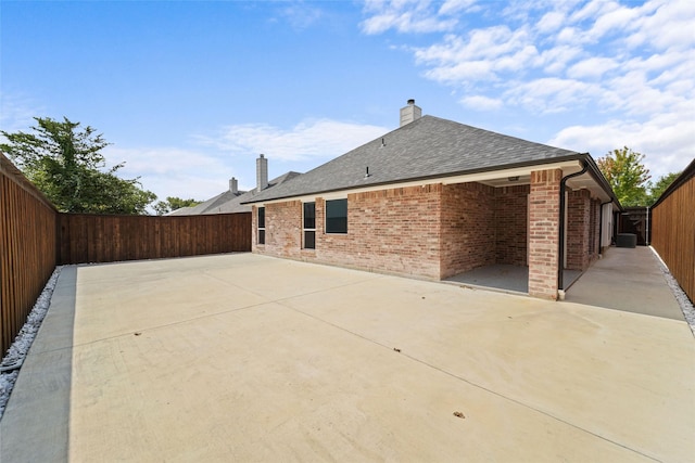 rear view of house with a patio