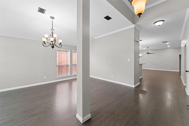 interior space featuring dark hardwood / wood-style flooring, ornamental molding, and a chandelier