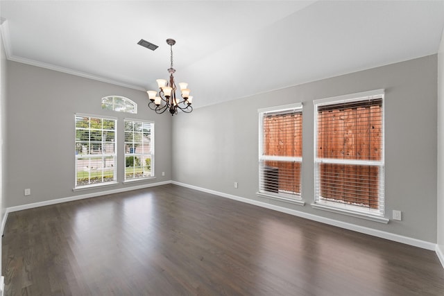 unfurnished room with a chandelier and dark hardwood / wood-style flooring