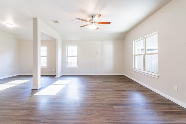 unfurnished room featuring lofted ceiling, ceiling fan, and dark wood-type flooring