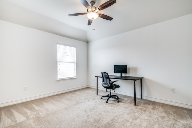 office area with lofted ceiling, light carpet, and ceiling fan