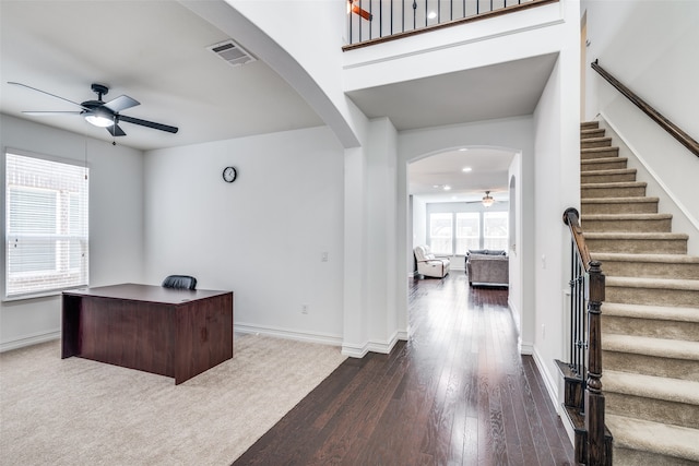 office featuring wood-type flooring and ceiling fan