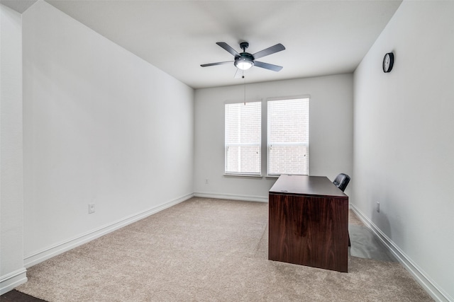 unfurnished office with light carpet and ceiling fan